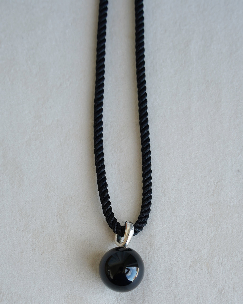 "Isabella Etou"  Onyx Form Pendant Cord Necklace