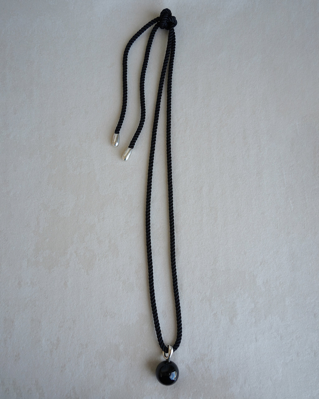 "Isabella Etou"  Onyx Form Pendant Cord Necklace