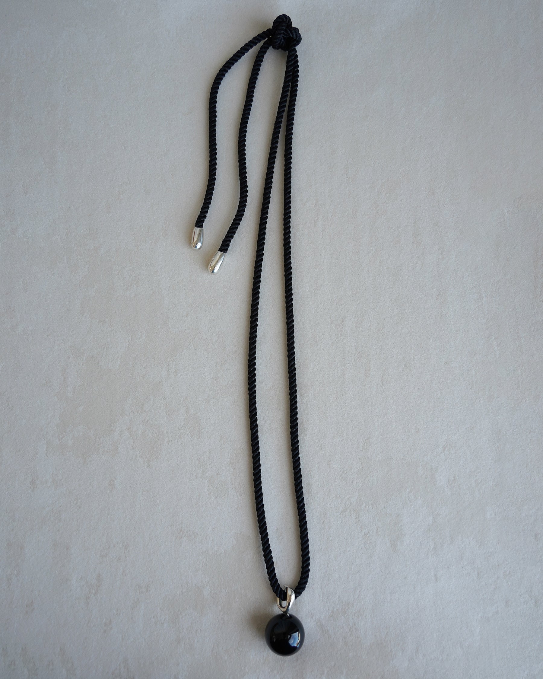 "Isabella Etou"  Onyx Form Pendant Cord Necklace