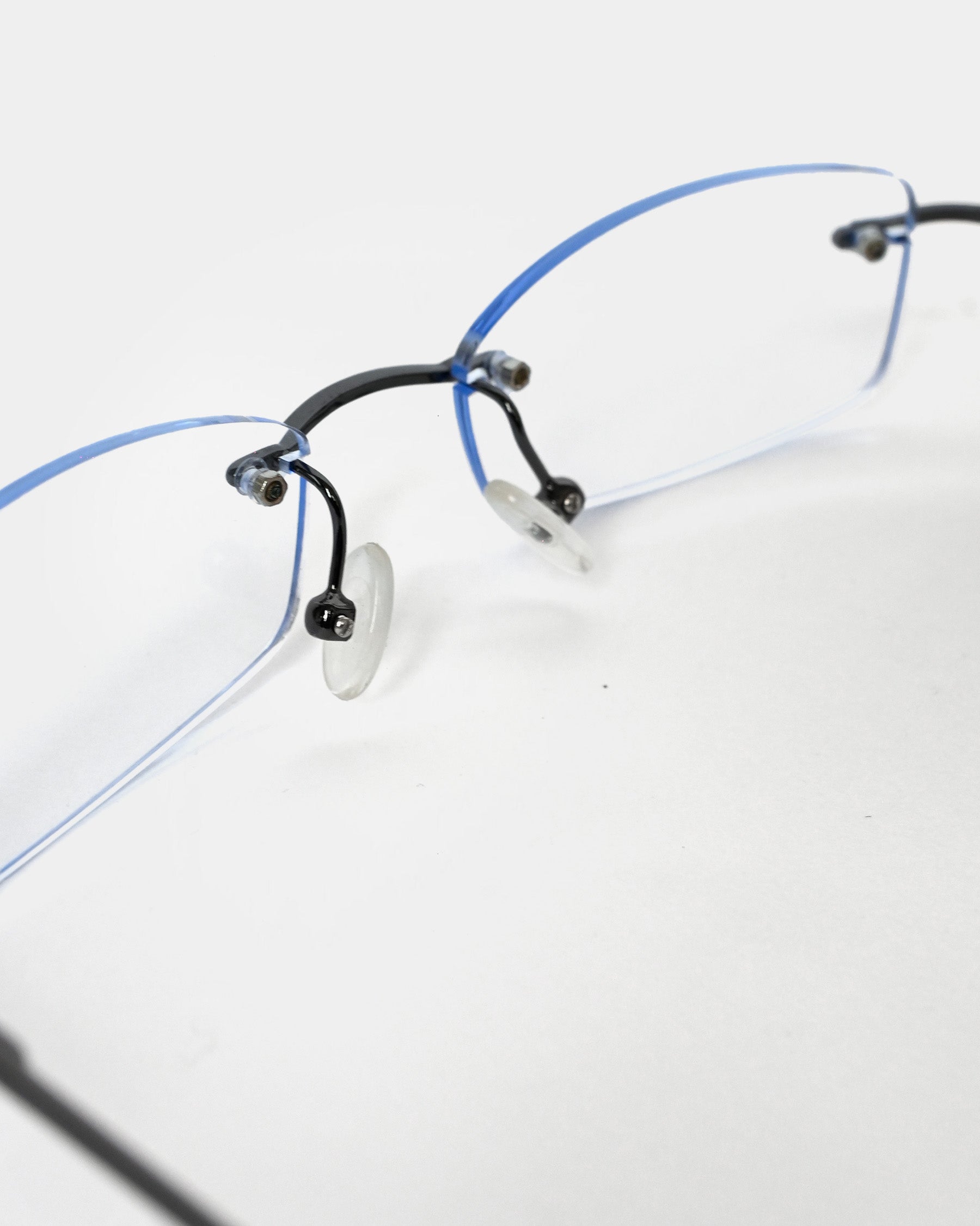 NOS 90s Light Blue Lens Framless Sunglasses