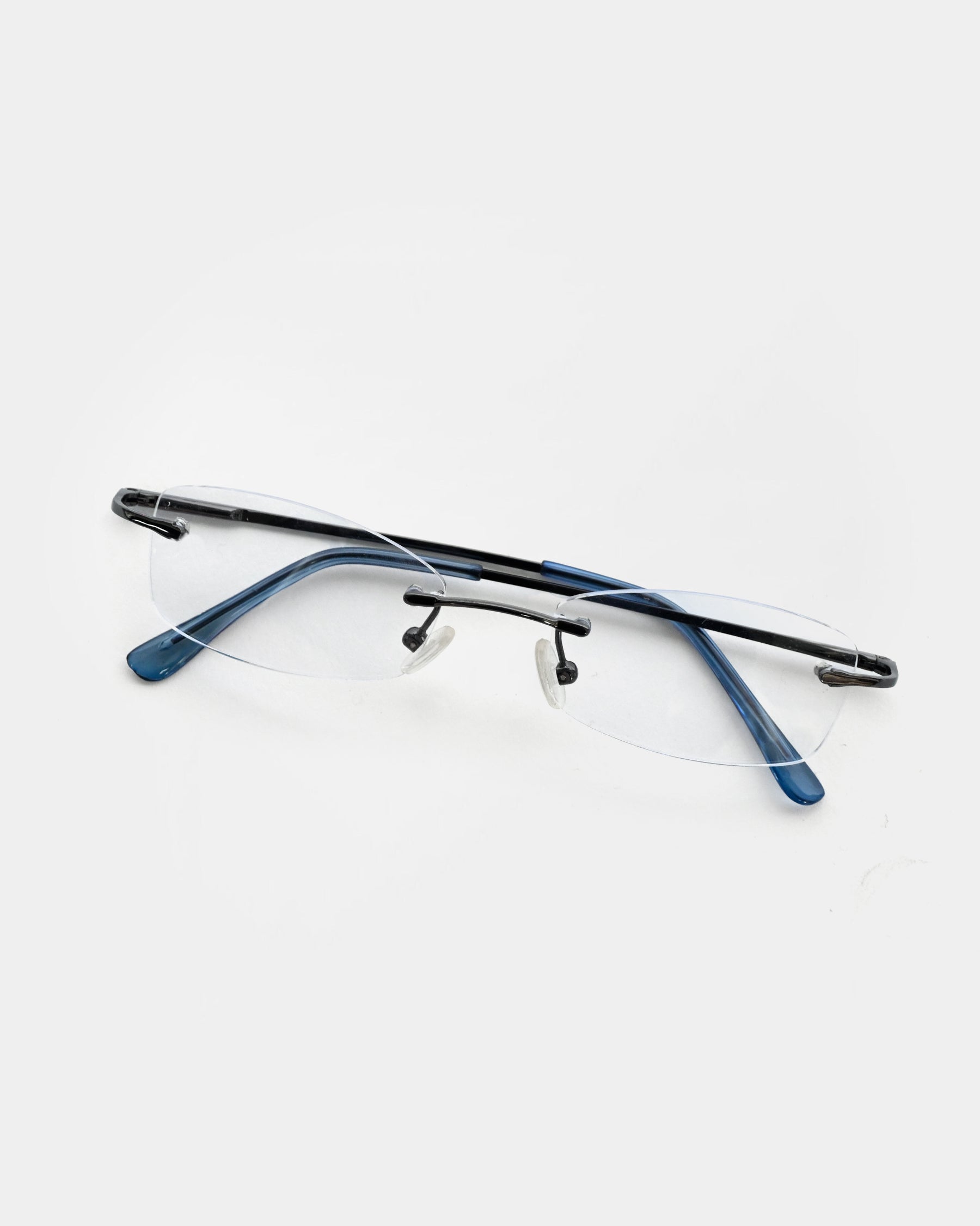 NOS 90s Light Blue Lens Framless Sunglasses