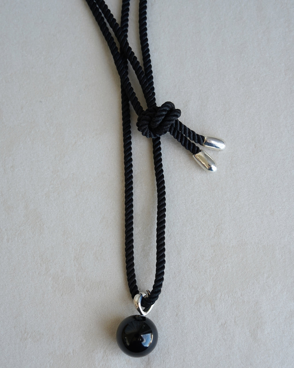 "Isabella Etou"  Onyx Form Pendant Cord Necklace