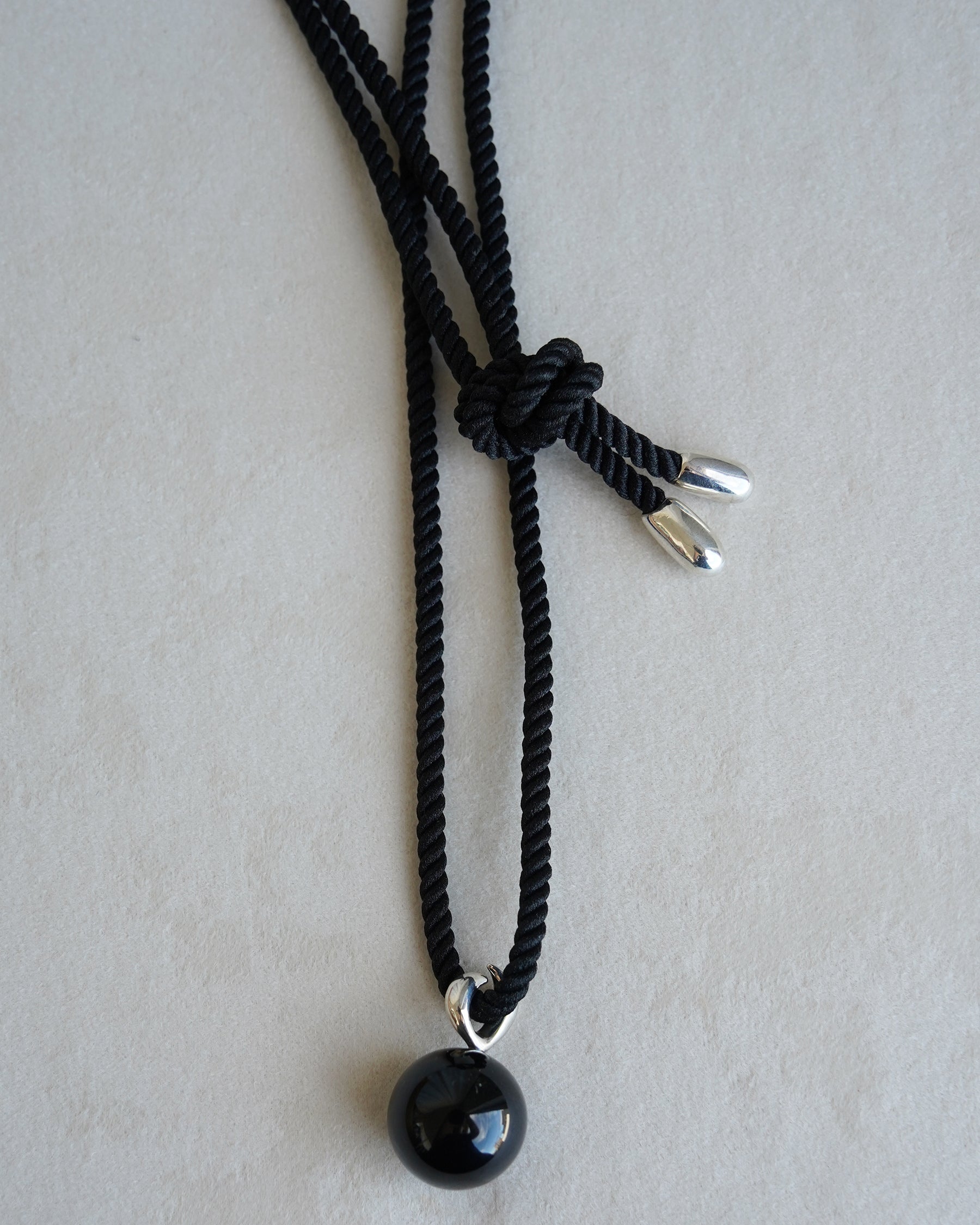 "Isabella Etou"  Onyx Form Pendant Cord Necklace