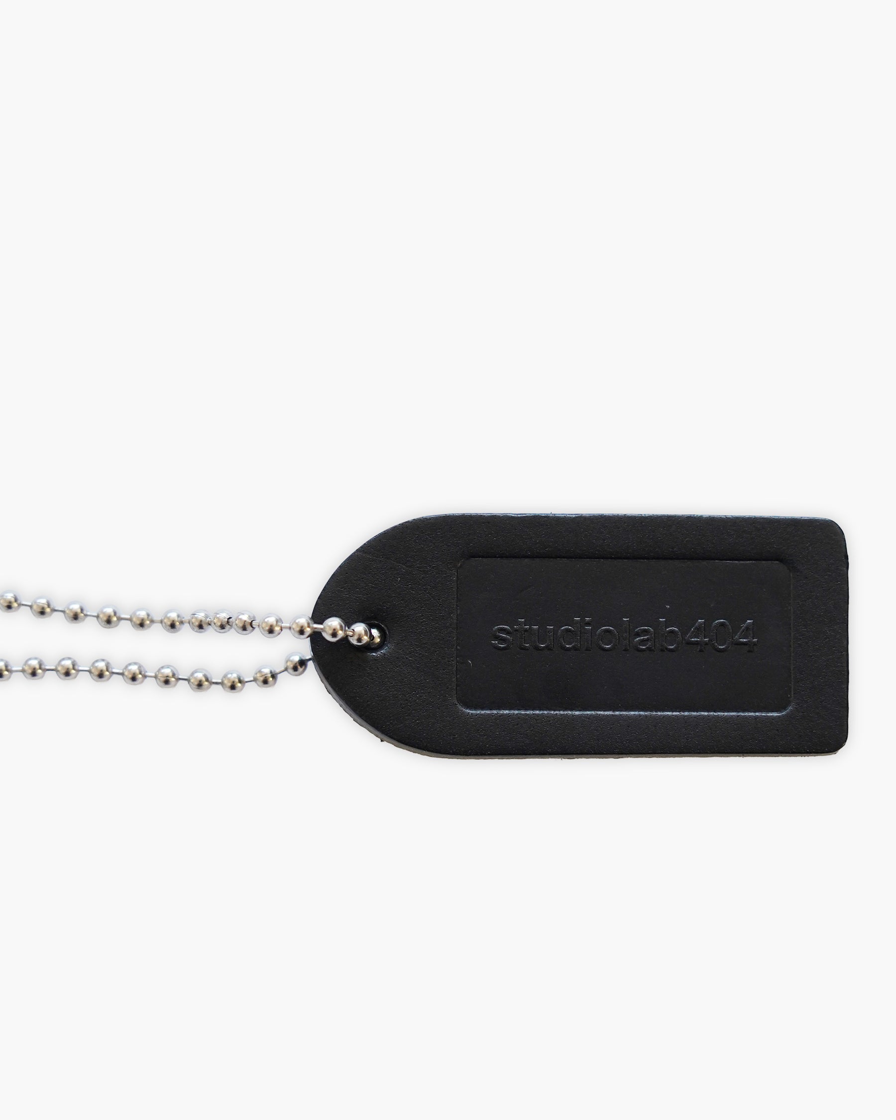 "studiolab404.com"  Leather Charm