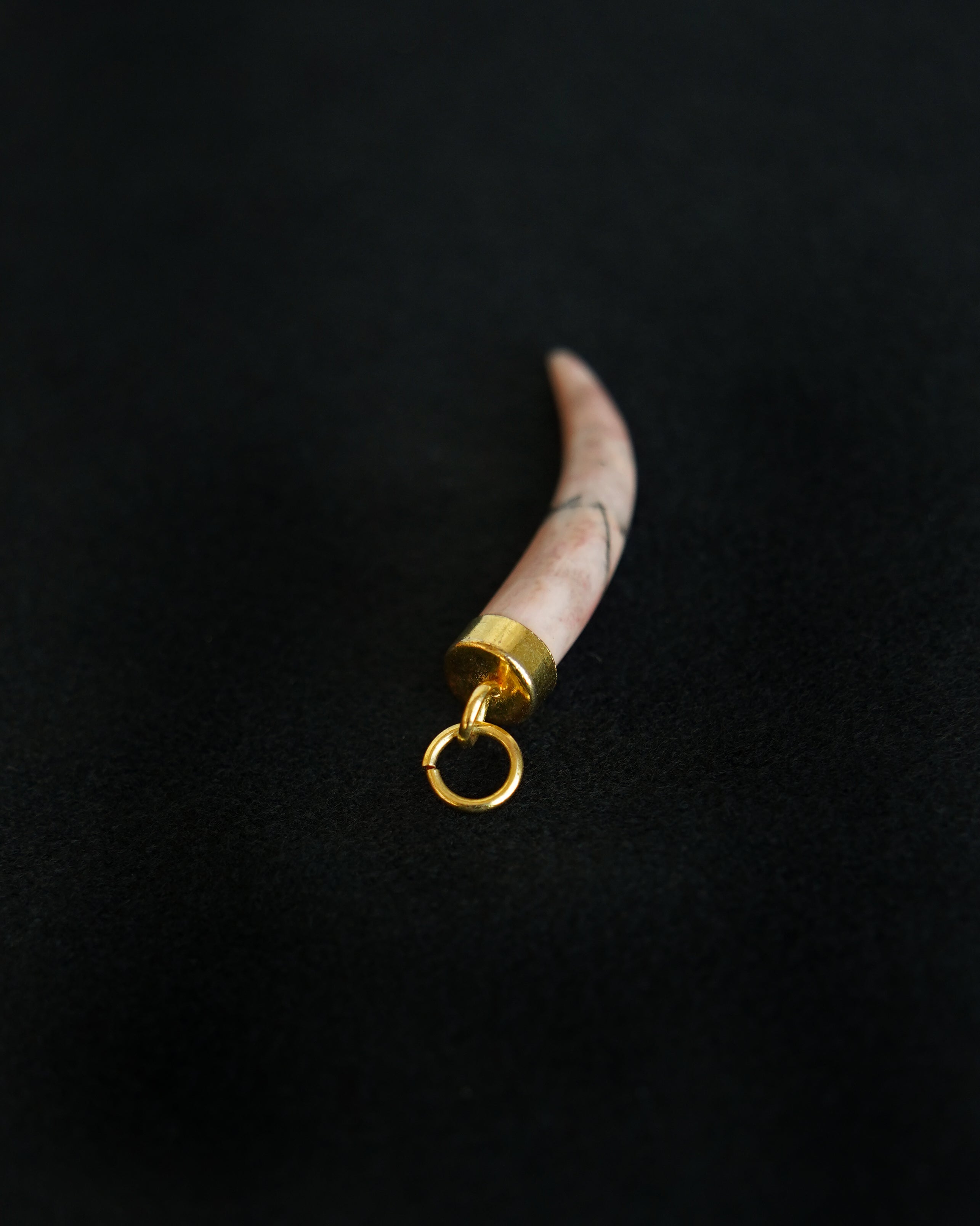 Rhodenite Horn Charm