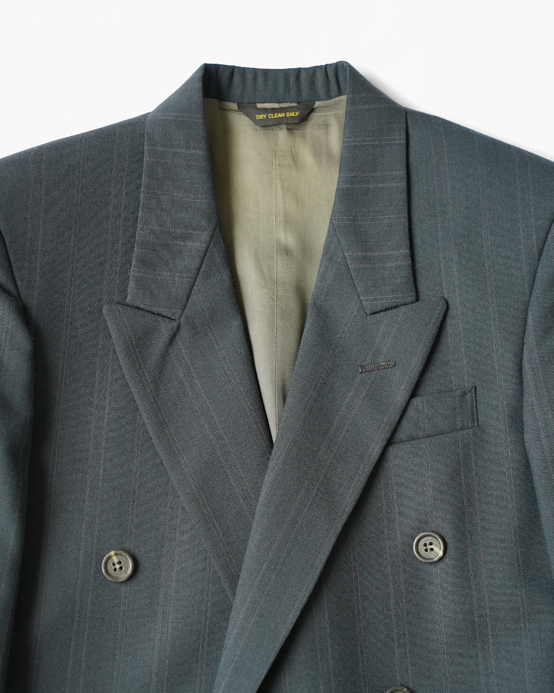 Double Breasted Suit in Deep Green Pinstripe