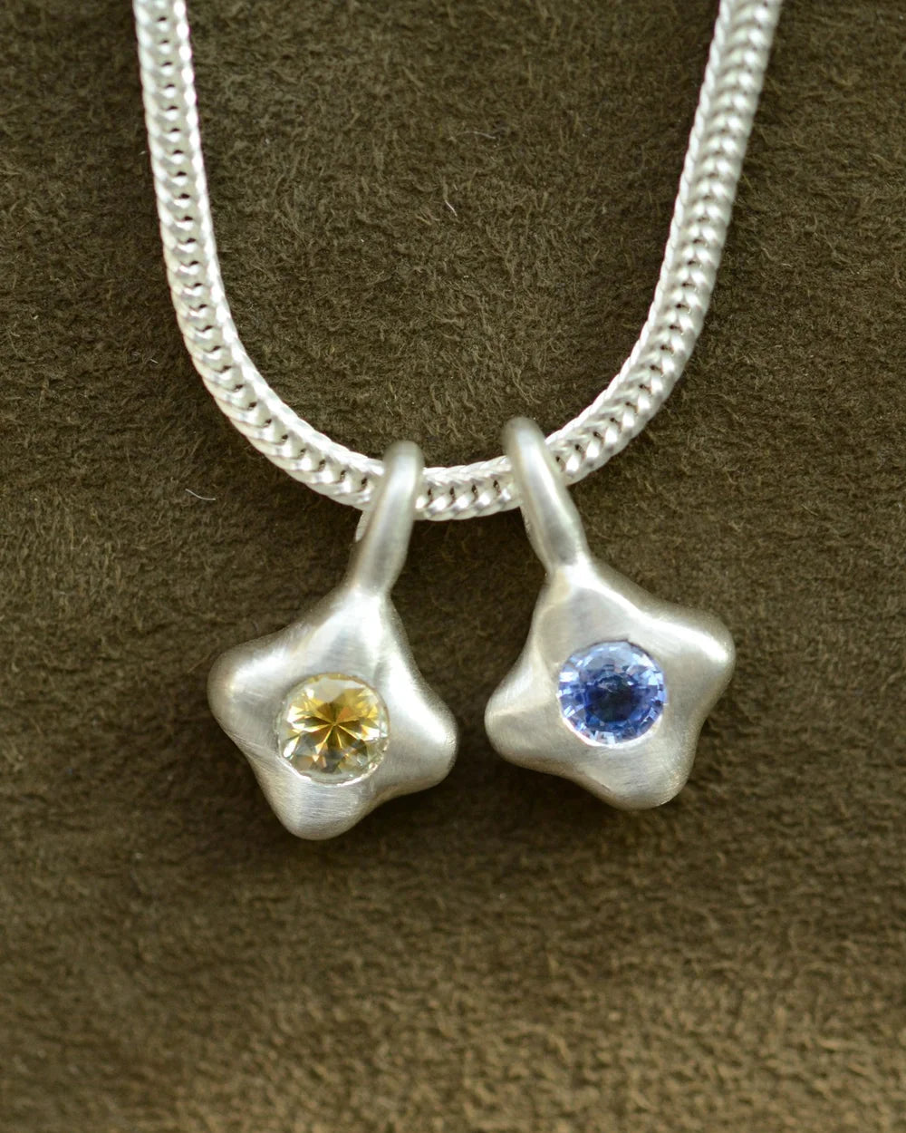 "Dunton Ellerkamp" Blue Sapphire and Silver Owen Solitaire Pendant