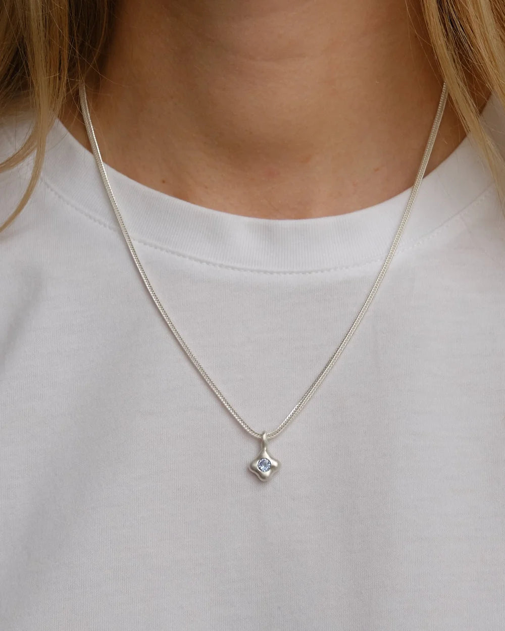 "Dunton Ellerkamp" Blue Sapphire and Silver Owen Solitaire Pendant
