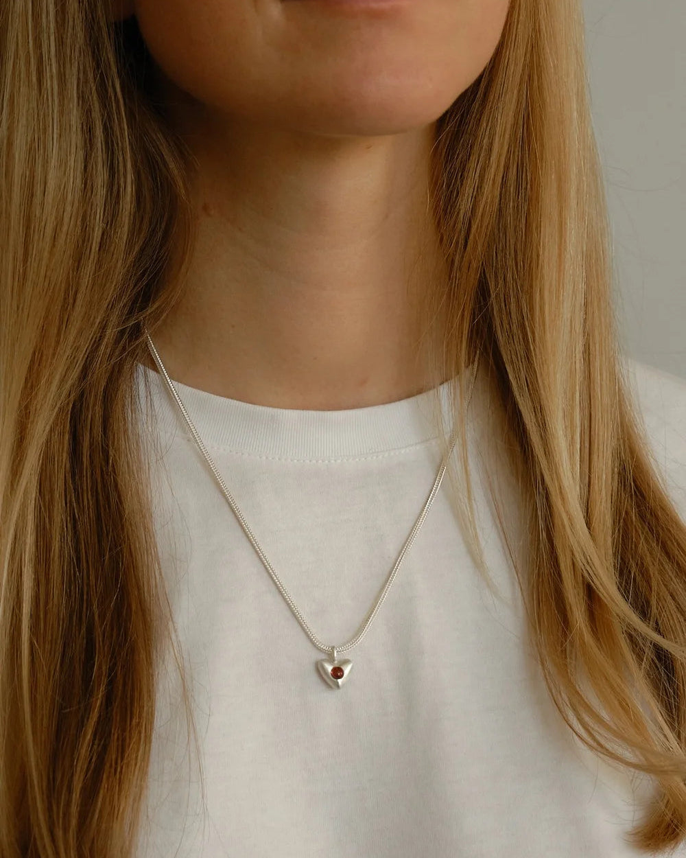 "Dunton Ellerkamp" Diminutive American Folk Heart Pendant with Garnet